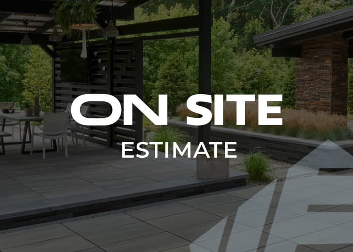 Holistic Patio measuring a backyard during an on-site estimate