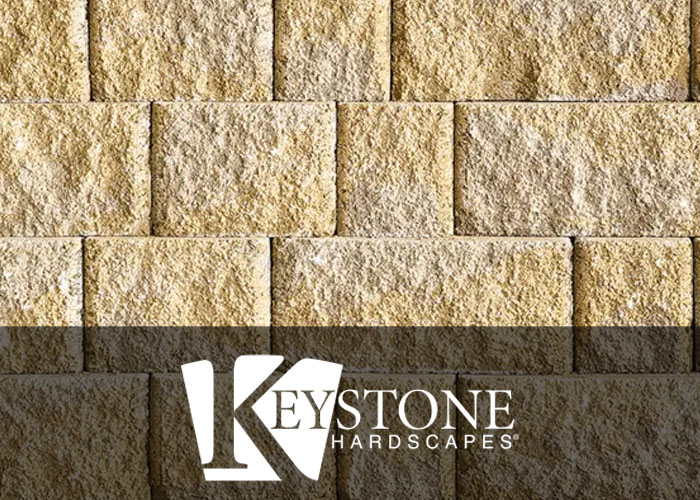 close-up of tan retaining wall blocks from Keystone Hardscapes used by retaining wall contractors in Fort Worth, TX