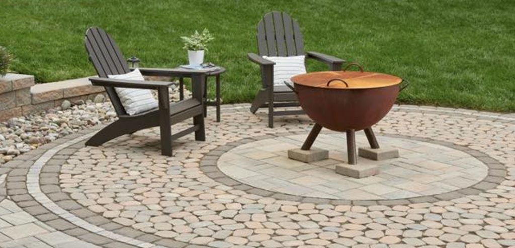 Holistic Patio Hardscaping Services in Fort Worth, TX - Holistic Patio Small Modern Patio Ideas for a Stylish Retreat Header circular paver patio with a fire pit and Adirondack chairs, showcasing Modern Patio Ideas for cozy outdoor spaces in Fort Worth, TX